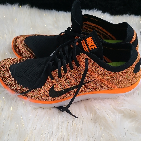 Nike Black and Orange Dynamic Sneakers - Picture 10 of 13